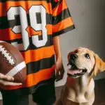 Person,With,Cincinnati,Bengals,Jersey,Next,To,Their,Dog